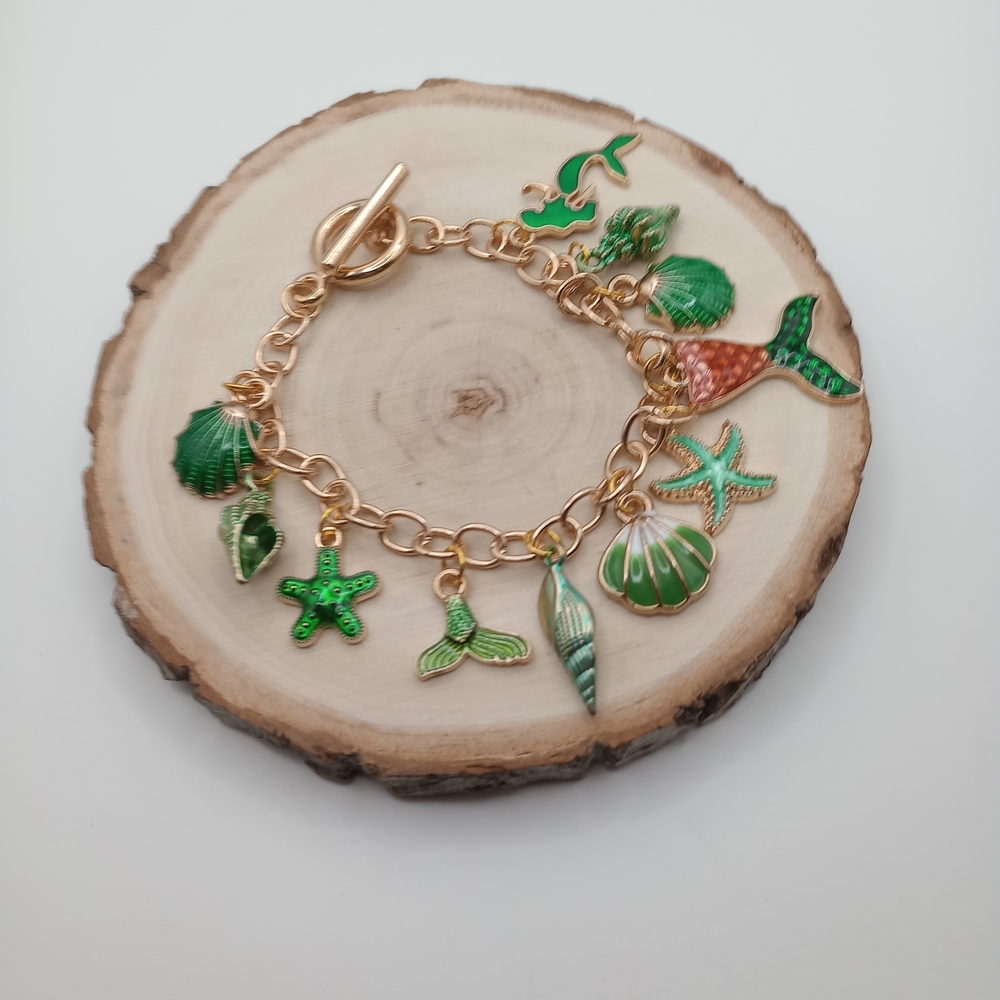 Gold Charm Bracelet with Green Sea Life Charms
